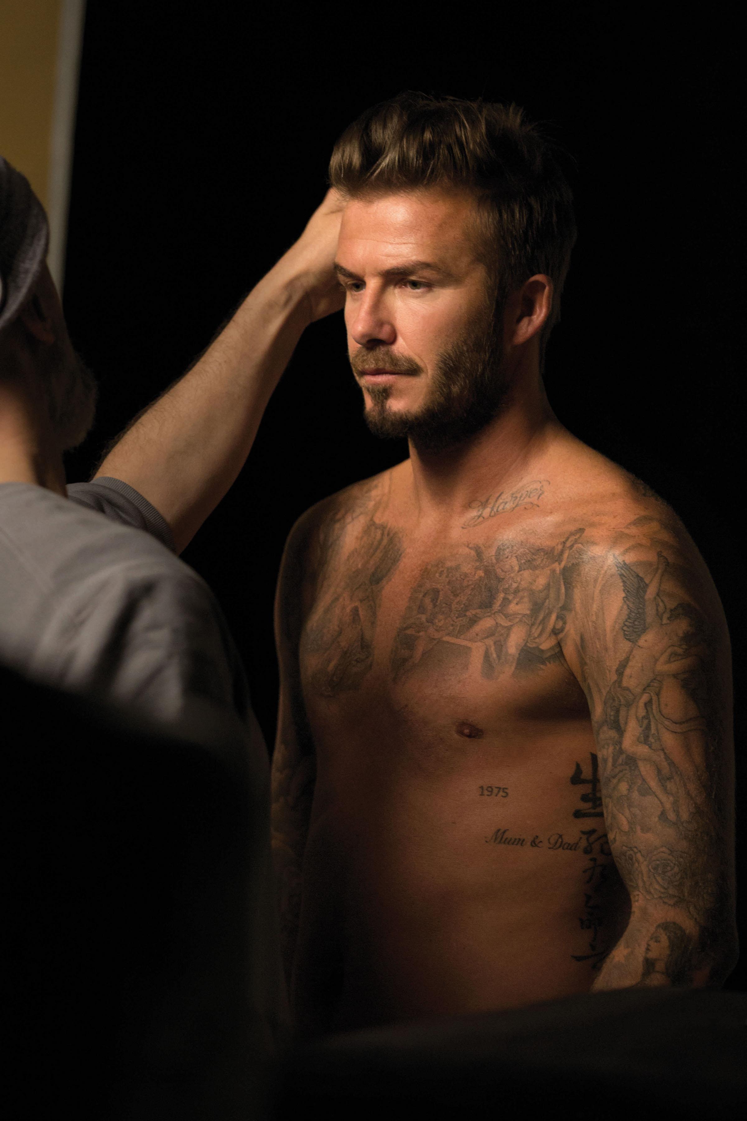 David Beckham goes shirtless in behind the scenes shots from his new fragrance campaign