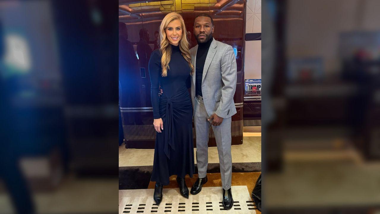 Photo of Katie Zacharia posed alongside Floyd Mayweather ahead of his appearance at a MAGA rally in Arizona.