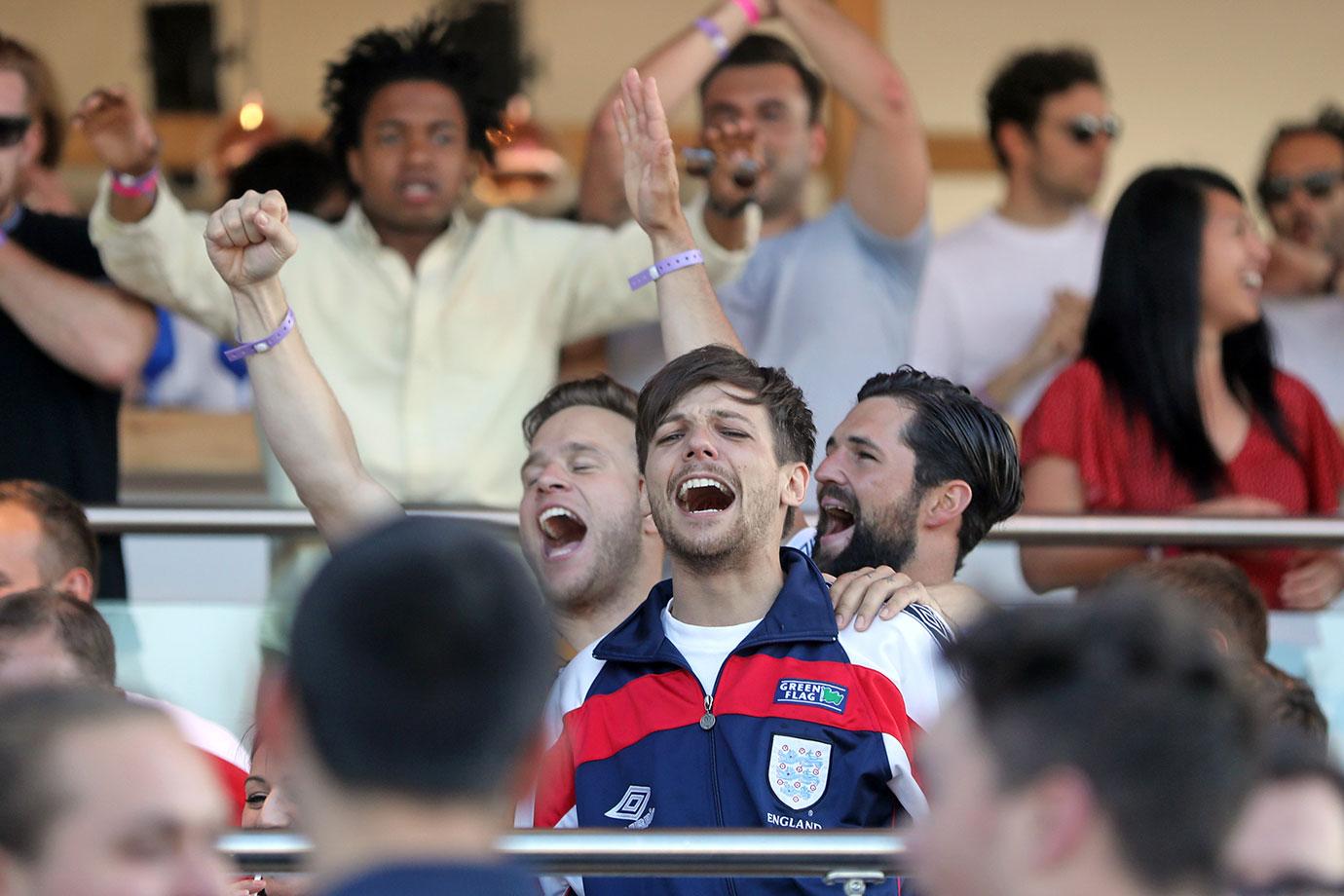 EXCLUSIVE: Louis Tomlinson and girlfriend watch England lose to Croatia