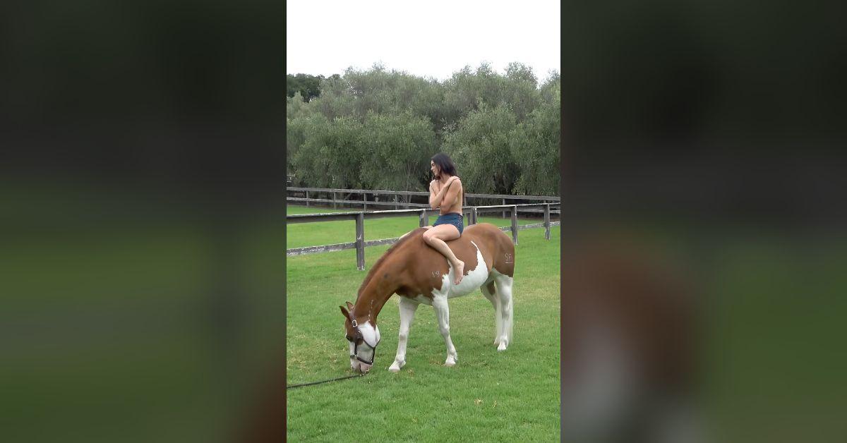 Image of Kendall Jenner almost exposed her b------ on a horse.