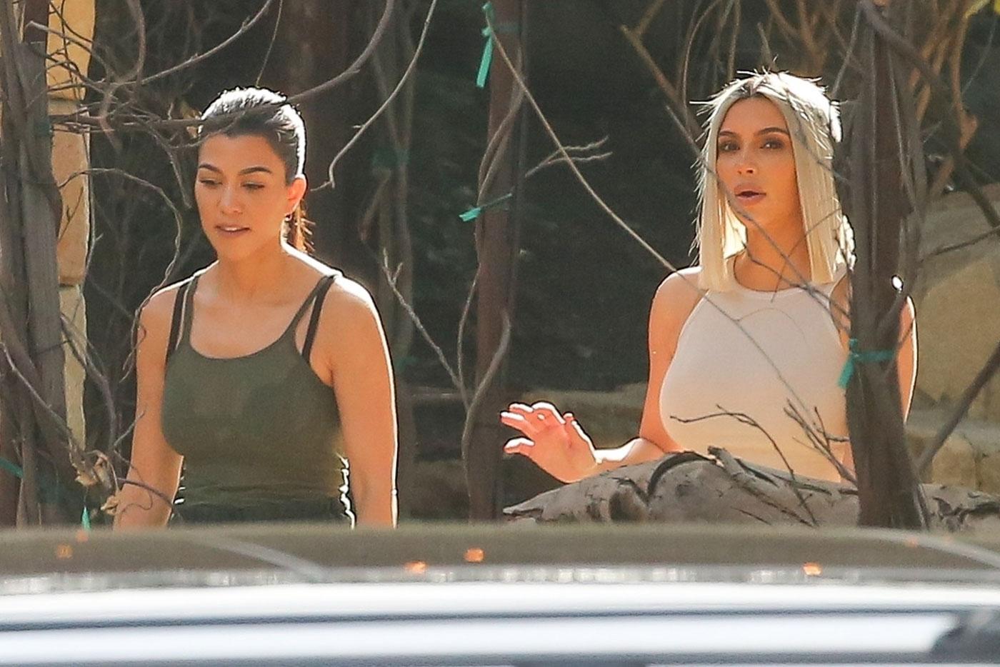 *EXCLUSIVE* The Kardashian sisters get busy filming in Malibu