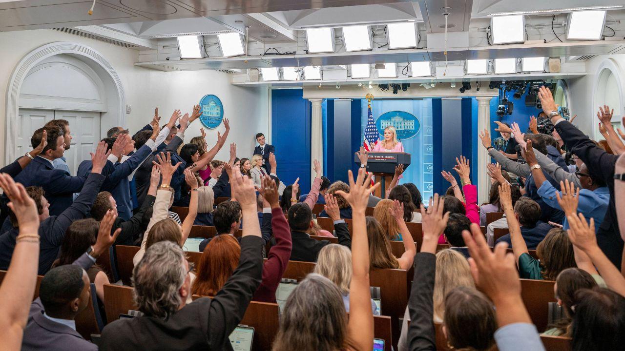 Image of The White House television pool typically shared presidential footage with participating broadcasters.