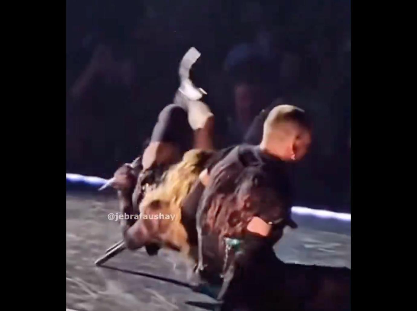 madonna falls chair stage concert performance seattle watch