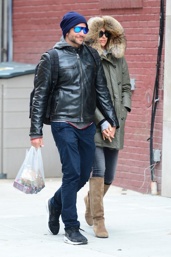 A chatty fan joins Bradley Cooper and girlfriend Irina on their Romantic Walk **USA ONLY**