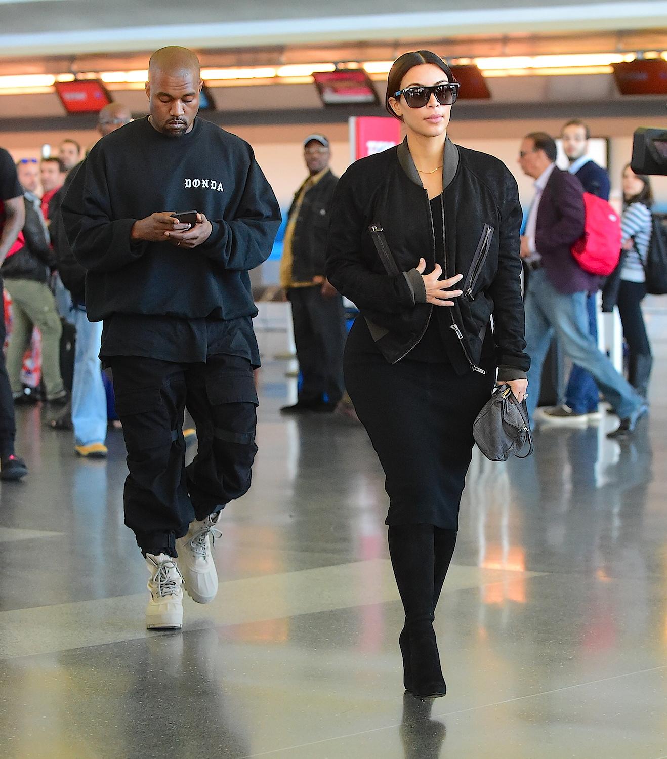 Kim Kardashian and Kanye West arrive in NYC to prepare for the Met Gala