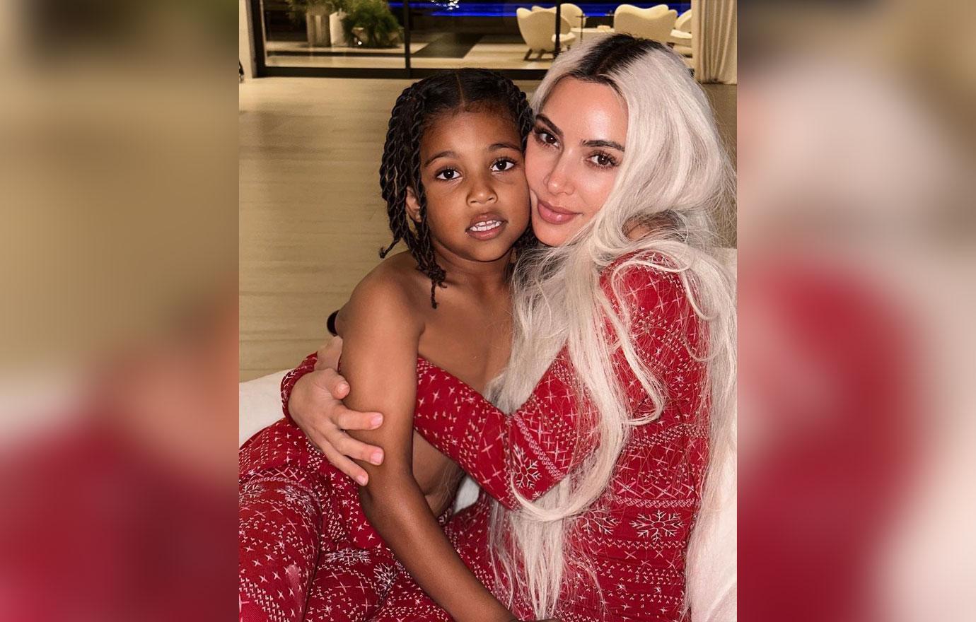 kim kardashian snuggles son saint welcome more kids