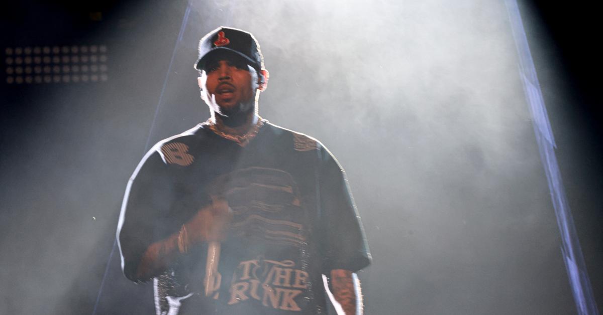 chris brown lawsuit warner bros sexual assault allegations libel