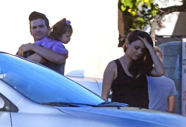 mila kunis pregnant baby bump tired