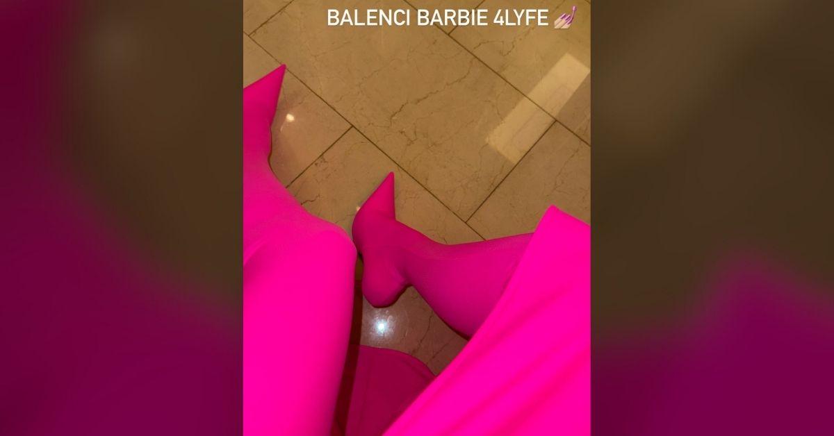 kim kardashian busts out tight neon pink dress paris fashion show