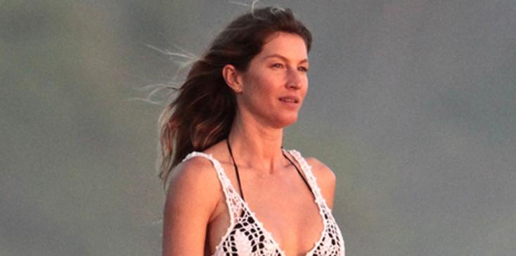 *EXCLUSIVE* Gisele Bundchen enjoys a sunset stroll on the beach with friends