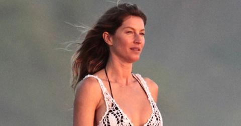 *EXCLUSIVE* Gisele Bundchen enjoys a sunset stroll on the beach with friends