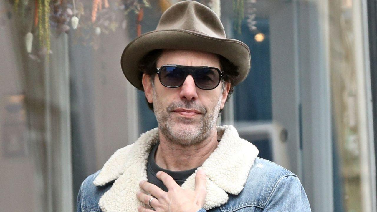 image of Cohen defended his controversial comedy, arguing that satire remains essential for exposing prejudice and challenging powerful institutions.
