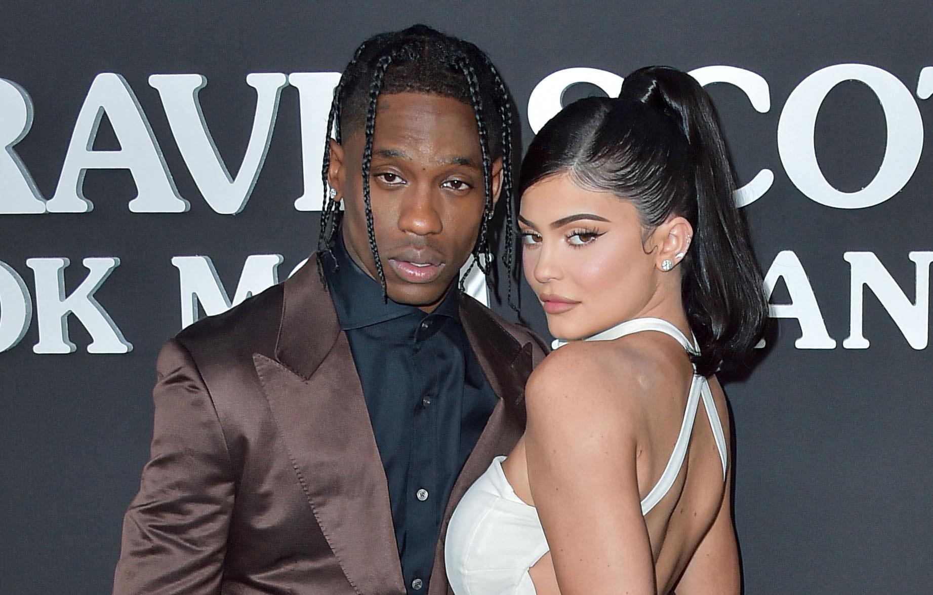 Kylie Jenner shows major side boob in nearly see-through nude dress after  family reunion with baby daddy Travis Scott