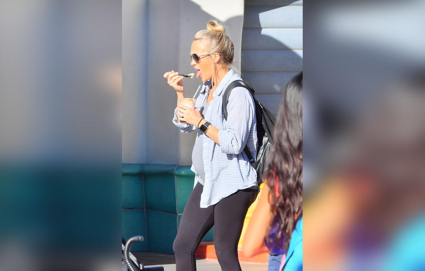 PICS Carrie Underwood Displays Her Massive Baby Bump At Disneyland!