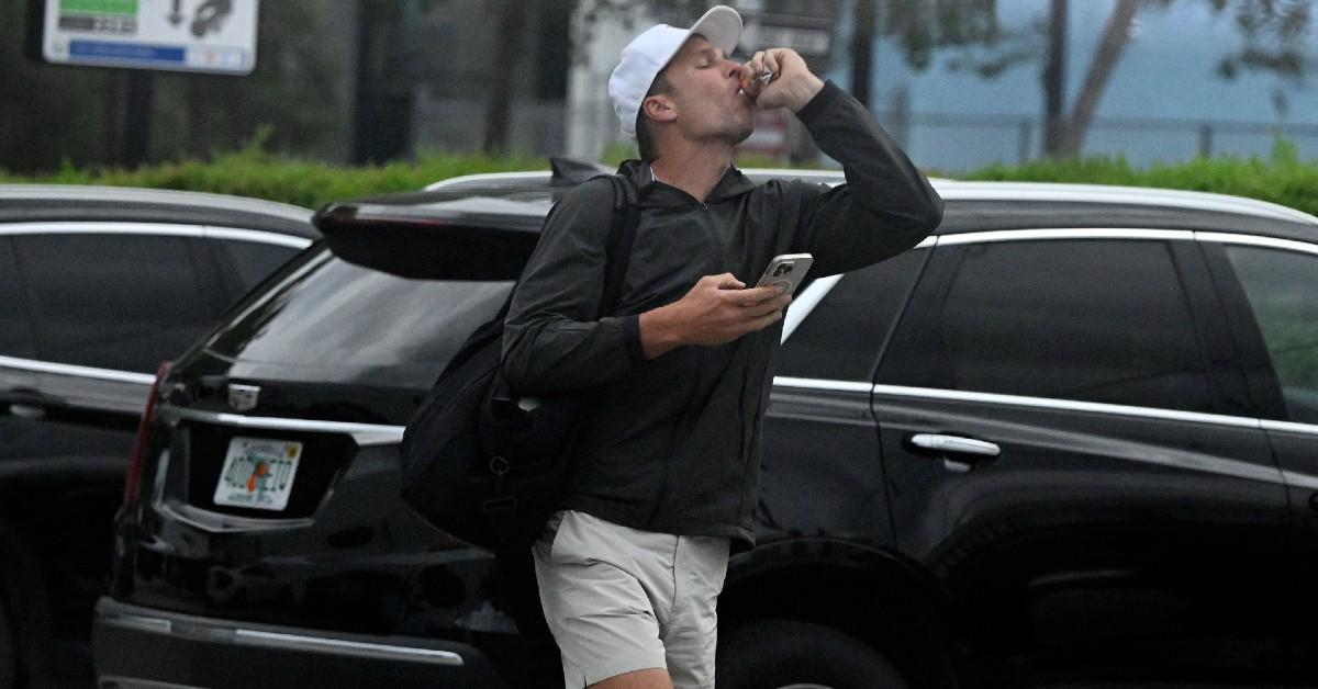 tom brady looks glum leaving gym