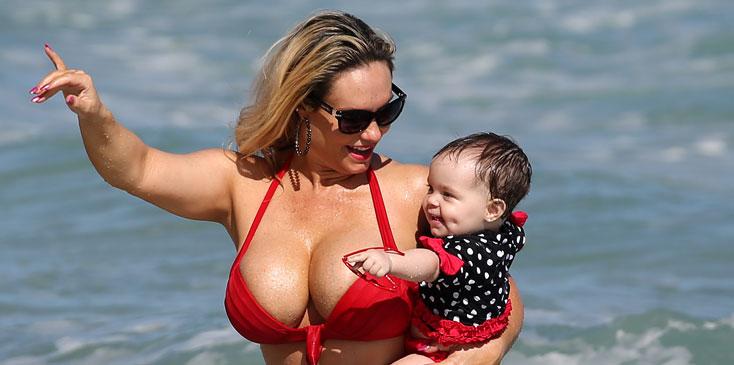 Coco Austin takes a dip as she enjoys watery playtime with baby