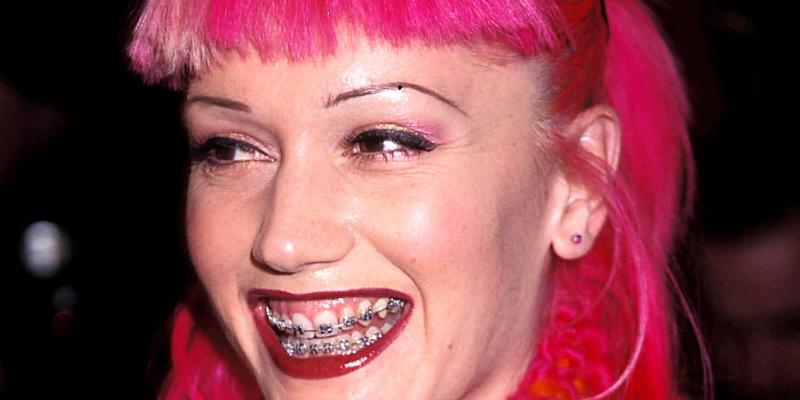 No Doubt singer Gwen Stefani was all smiles with her braces shining up the night that were almost as bright as her searing pink hair.