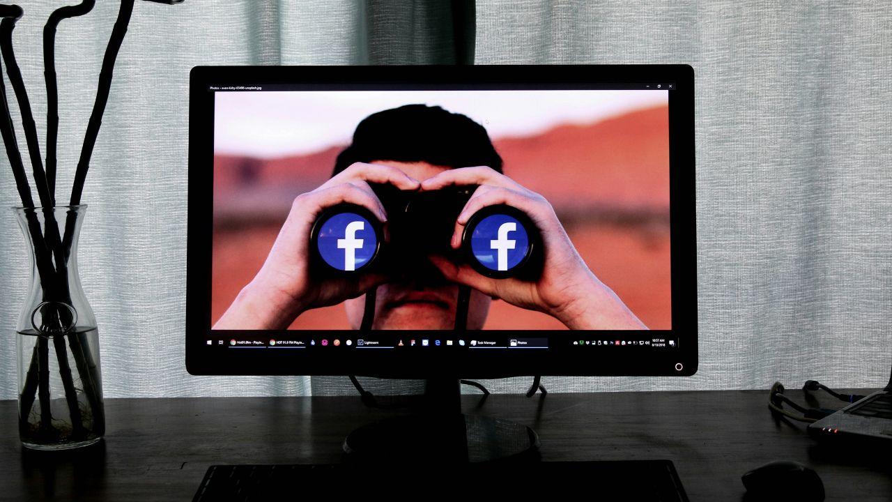 Facebook logo on screen