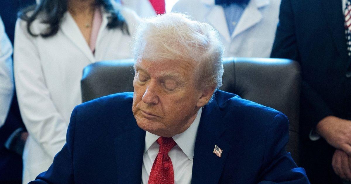 image of The sleepy moment happened while the president signed an executive order.