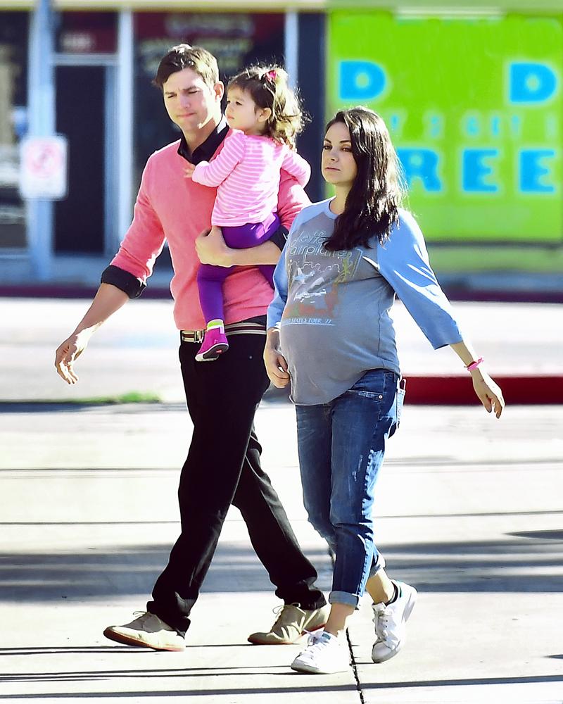 A very pregnant Mila Kunis along with husband Ashton Kutcher head to breakfast with daughter Wyatt in Studio City, CA