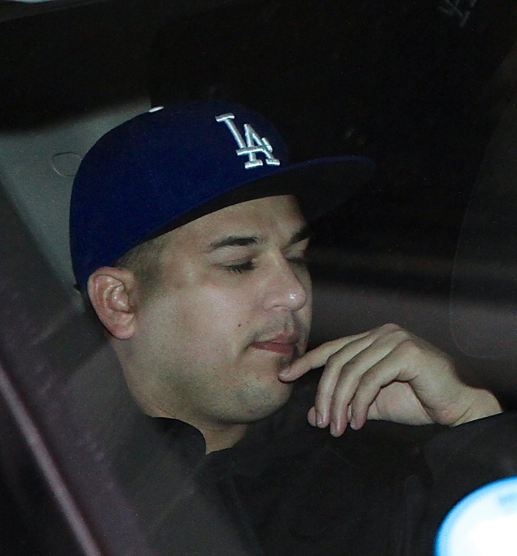 Rob Kardashian Leaves NYC hotel with Mystery Blonde