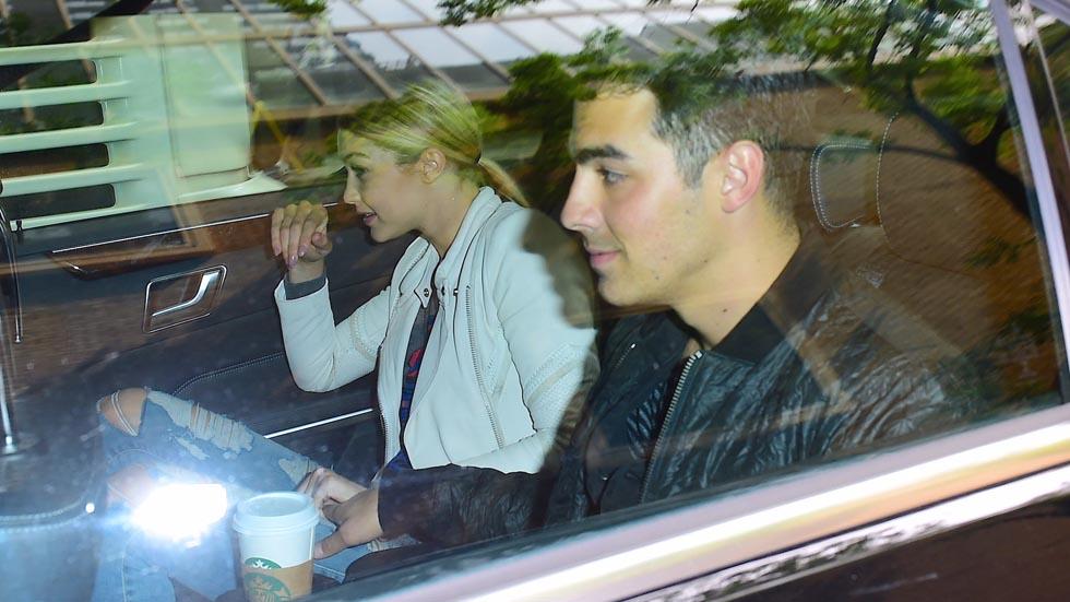 EXCLUSIVE: Joe Jonas and Gigi Hadid hold hands while driving in NYC