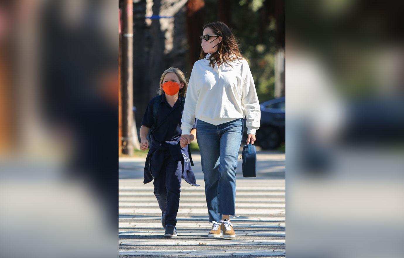 jennifer garner picks up son samuel from school while romance john miller gets serious