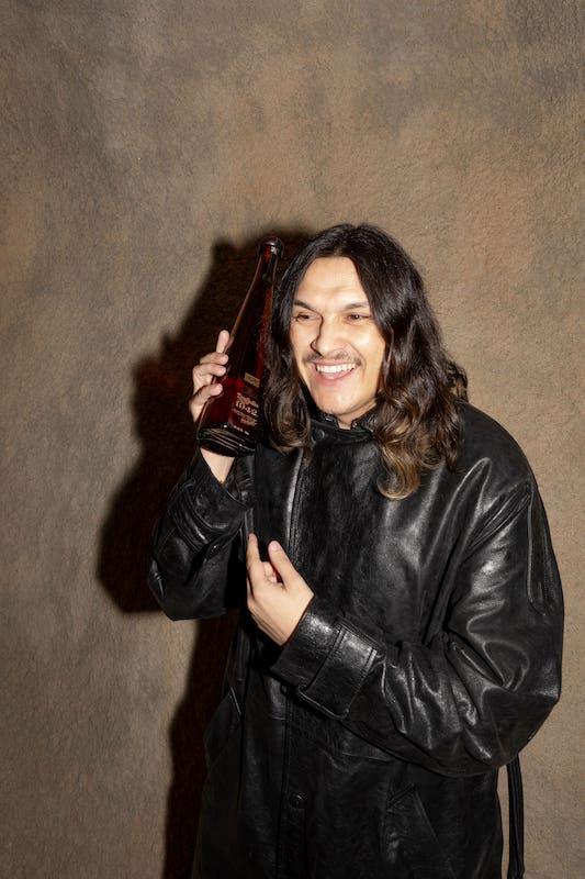 menswear designer guillermo andrade celebrates with tequila don julio at the opening of the los angeles flagship store  melrose place on february