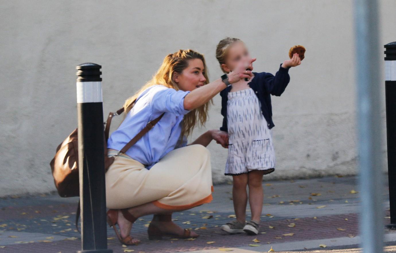 amber heard seen in madrid with daughter ok