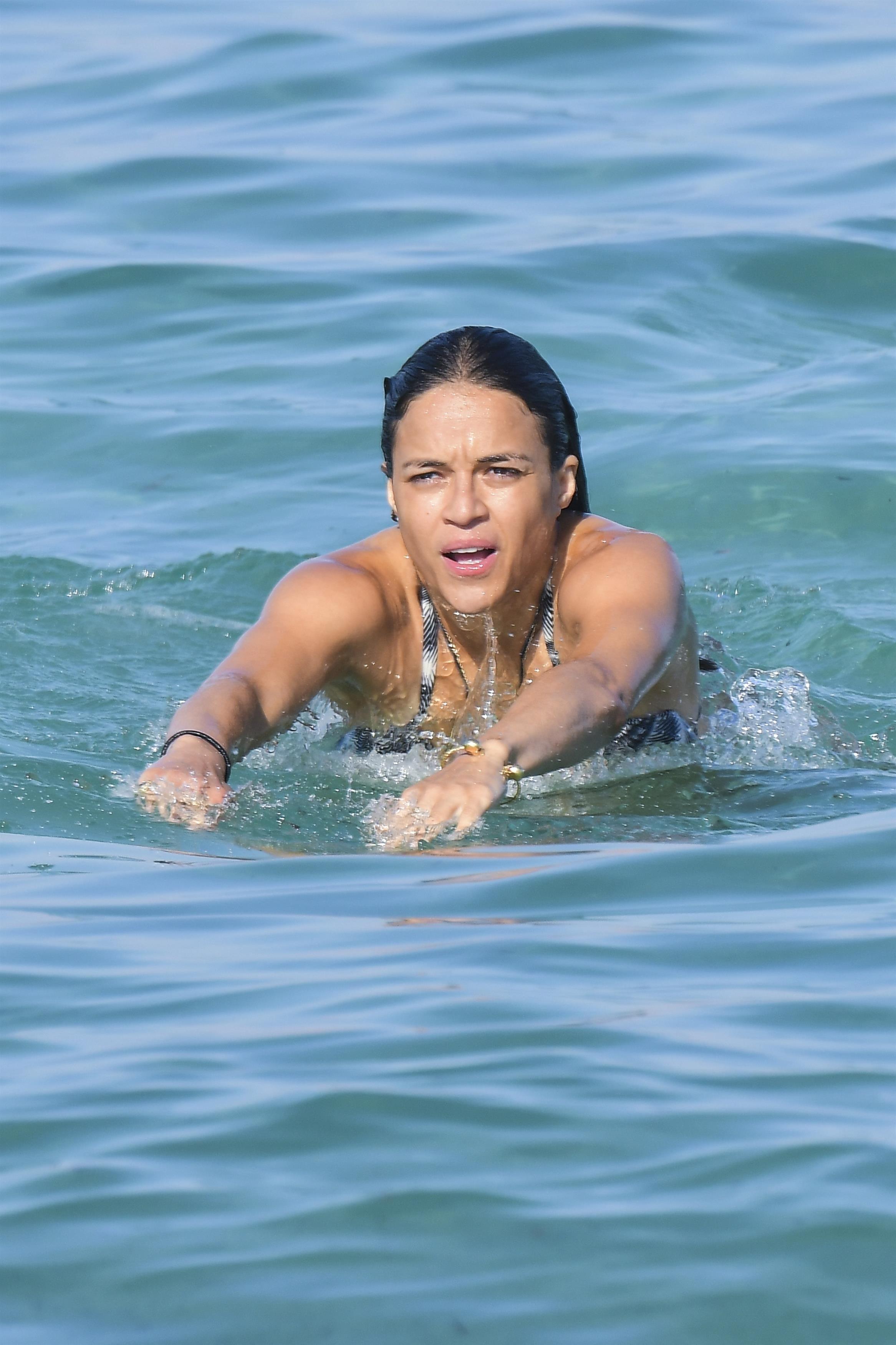 Michelle Rodriguez and Mohammed Al Turki enjoy the beach of CLUB 55 in St Tropez