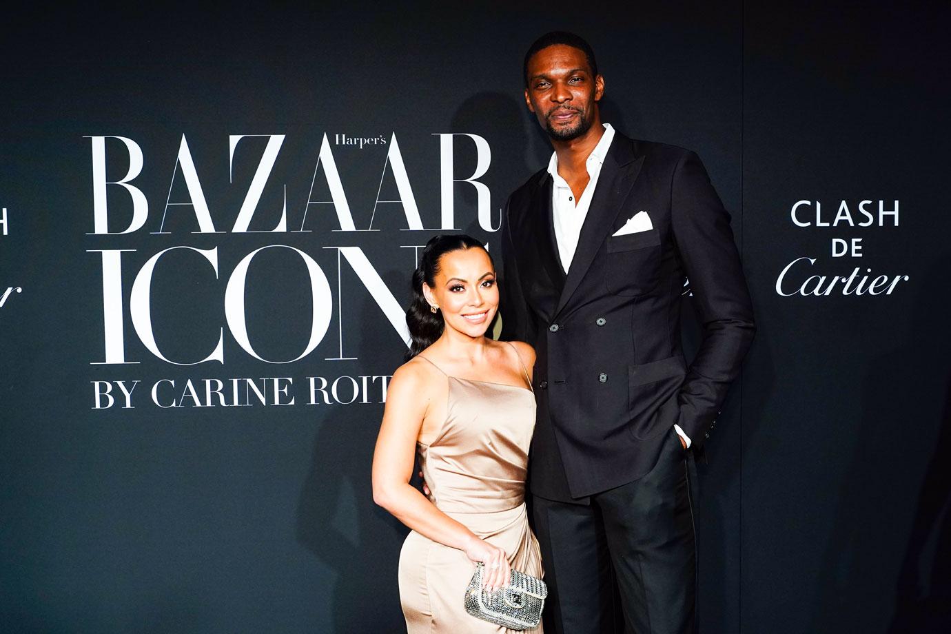 Chris Bosh and Adrienne Bosh attend Harper's BAZAAR Celebrates ICONS By Carine Roitfeld