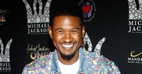 Usher Smiling At An Event
