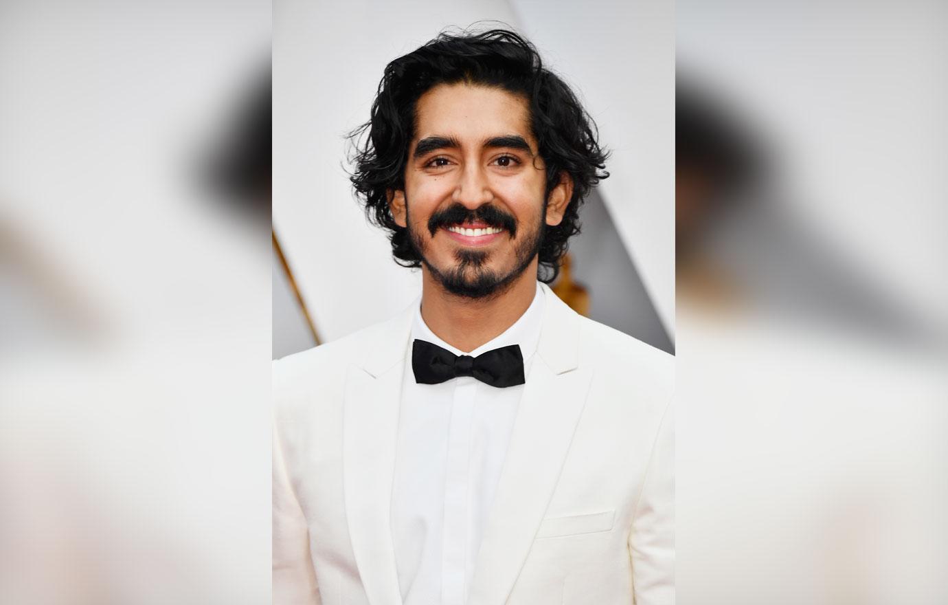 Andrew Garfield Dev Patel Embrace Kiss Oscars 03