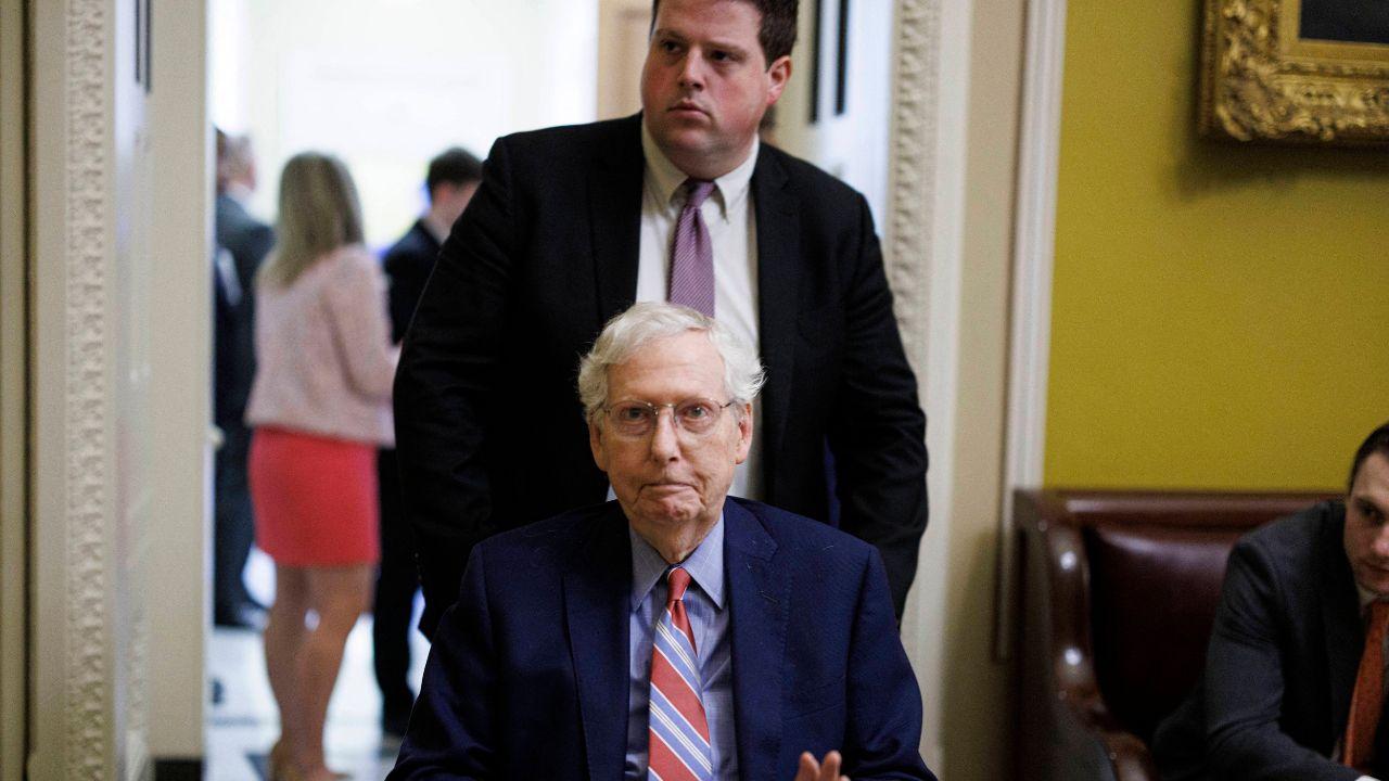 Image of Aides remained close to Mitch McConnell as senators worked through the confusing exchange.