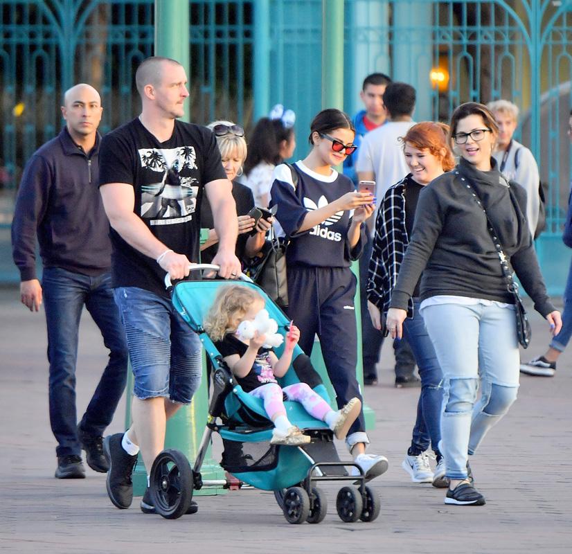 Selena Gomez Hangs Out With Family At Disneyland