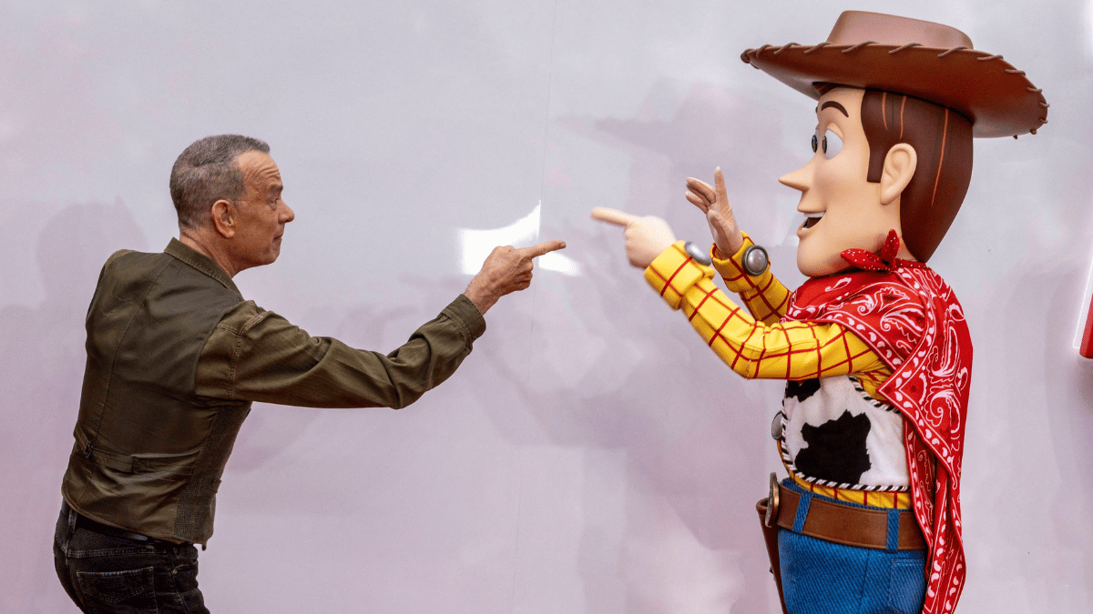 Photo of Tom Hanks and Woody from 'Toy Story 5'