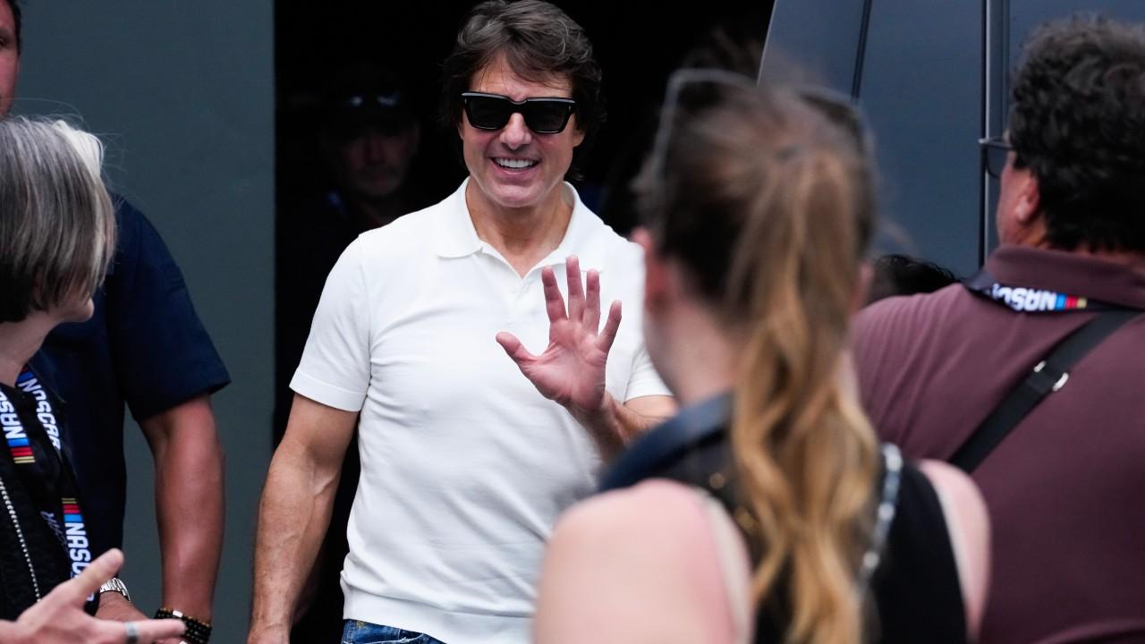 Tom Cruise turned up at Daytona International Speedway after confirming his return to 'Days of Thunder.'