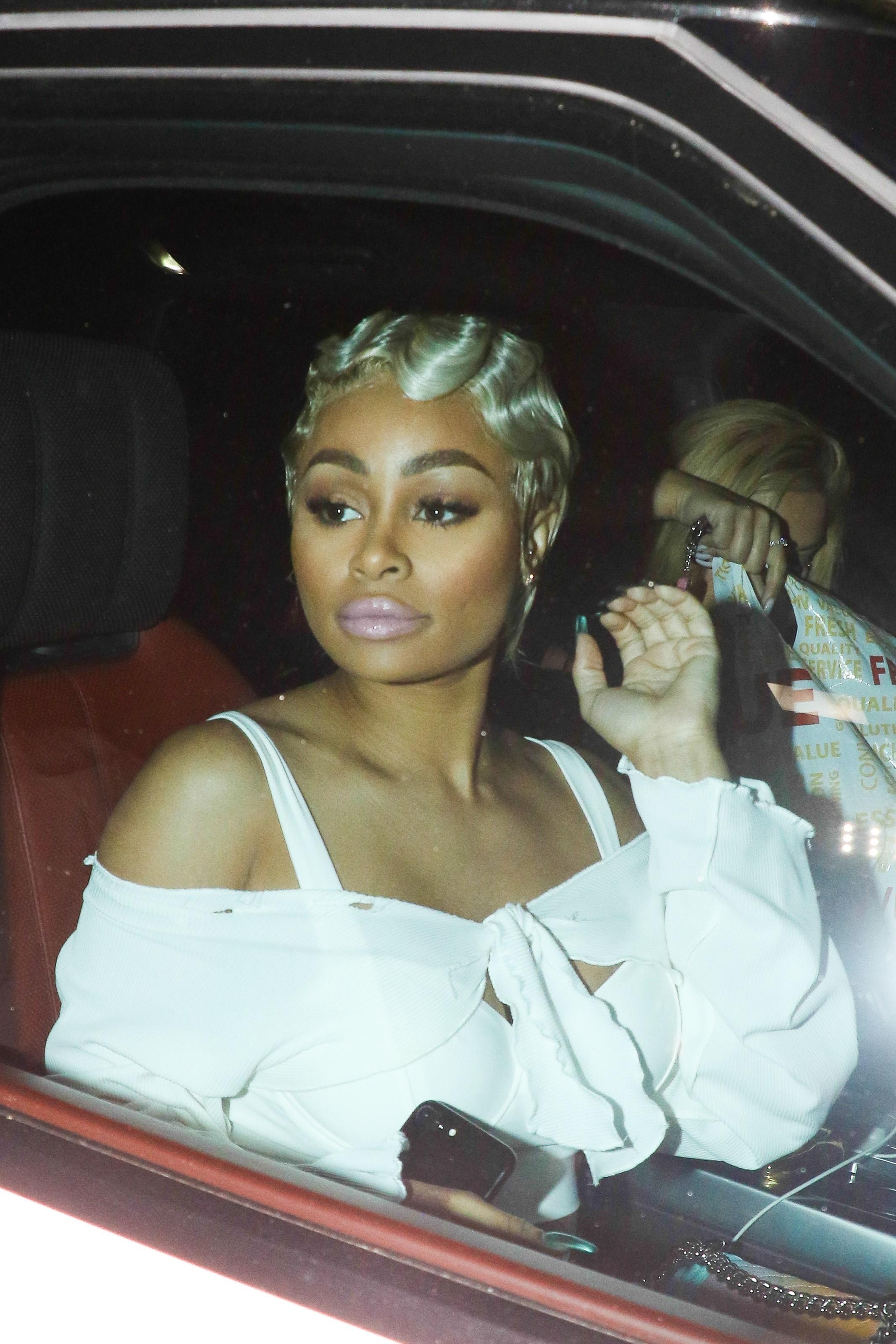 Blac Chyna Kisses a man goodbye after a late night at the studio