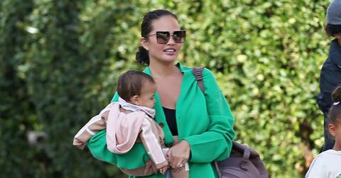 chrissy teigen excited daughter esti months started crawling photo