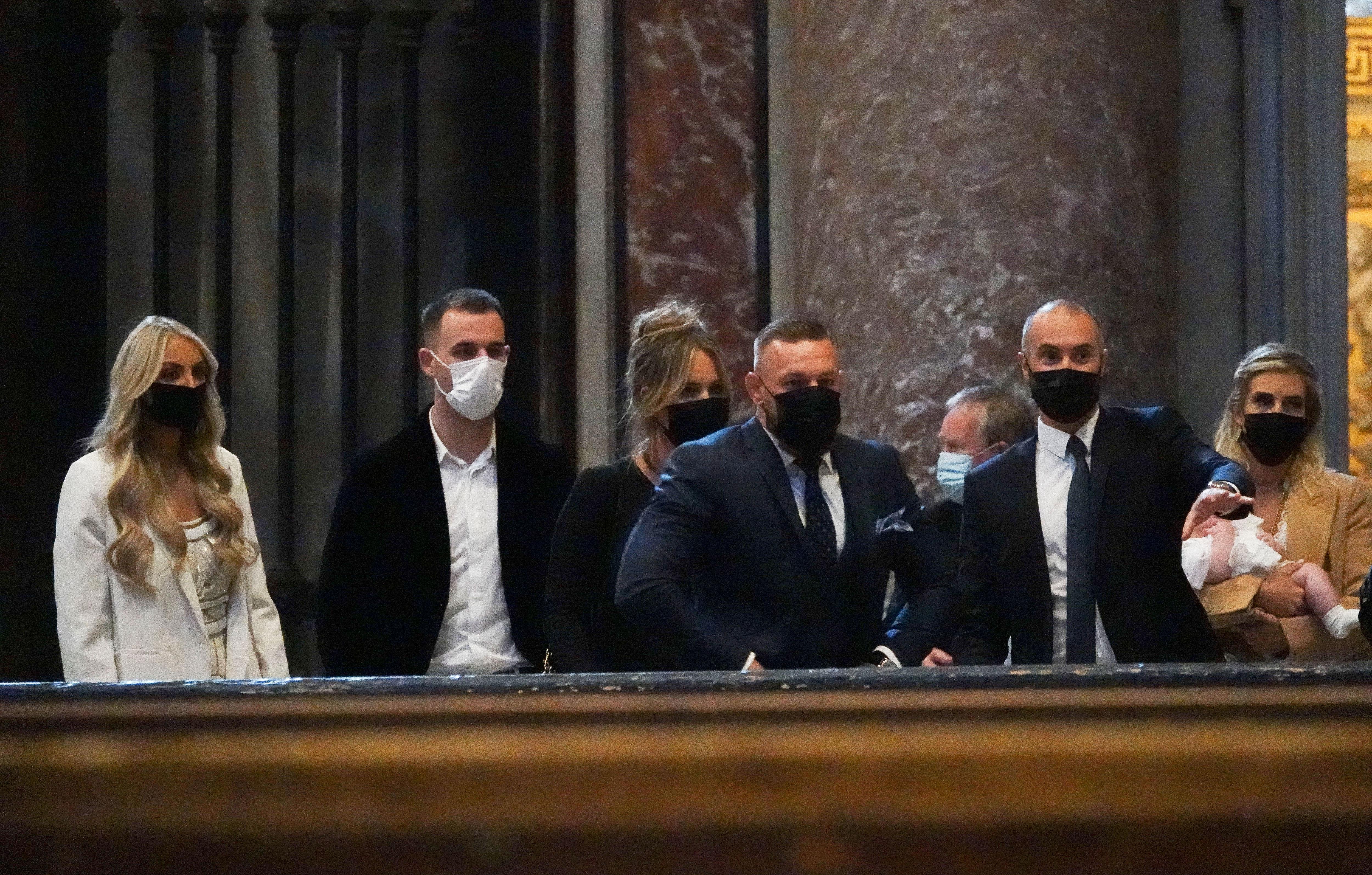 conor mcgregor and wife are spotted inside the vatican for the christening of son