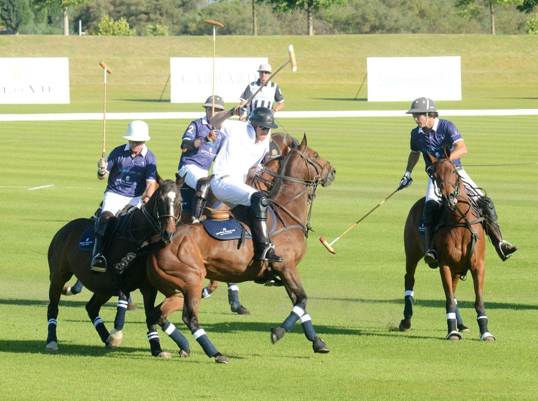 Prince Harry falls off horse during Sentebale charity polo match **USA ONLY**