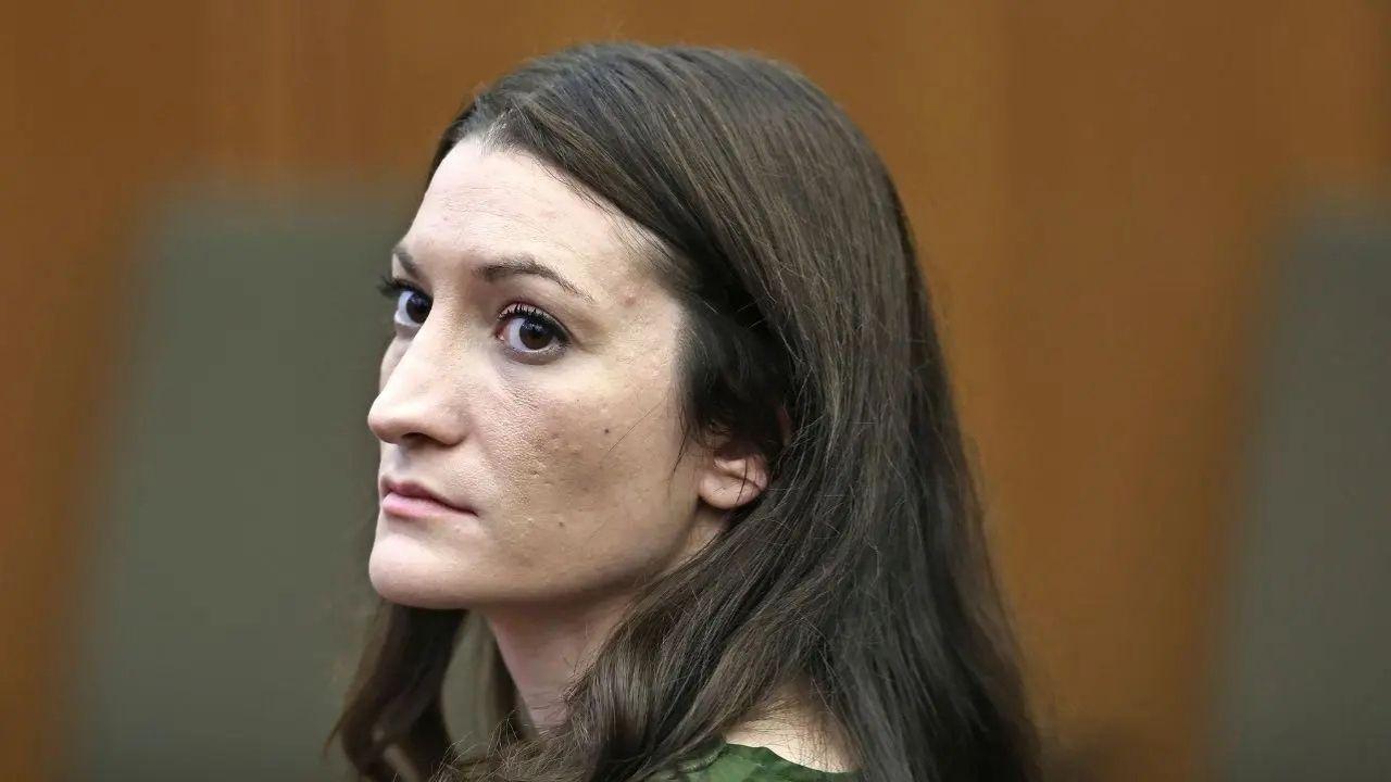 Photo of Lindsay Clancy is accused of strangling her three children before attempting suicide by slitting her wrist and jumping from a second story window.