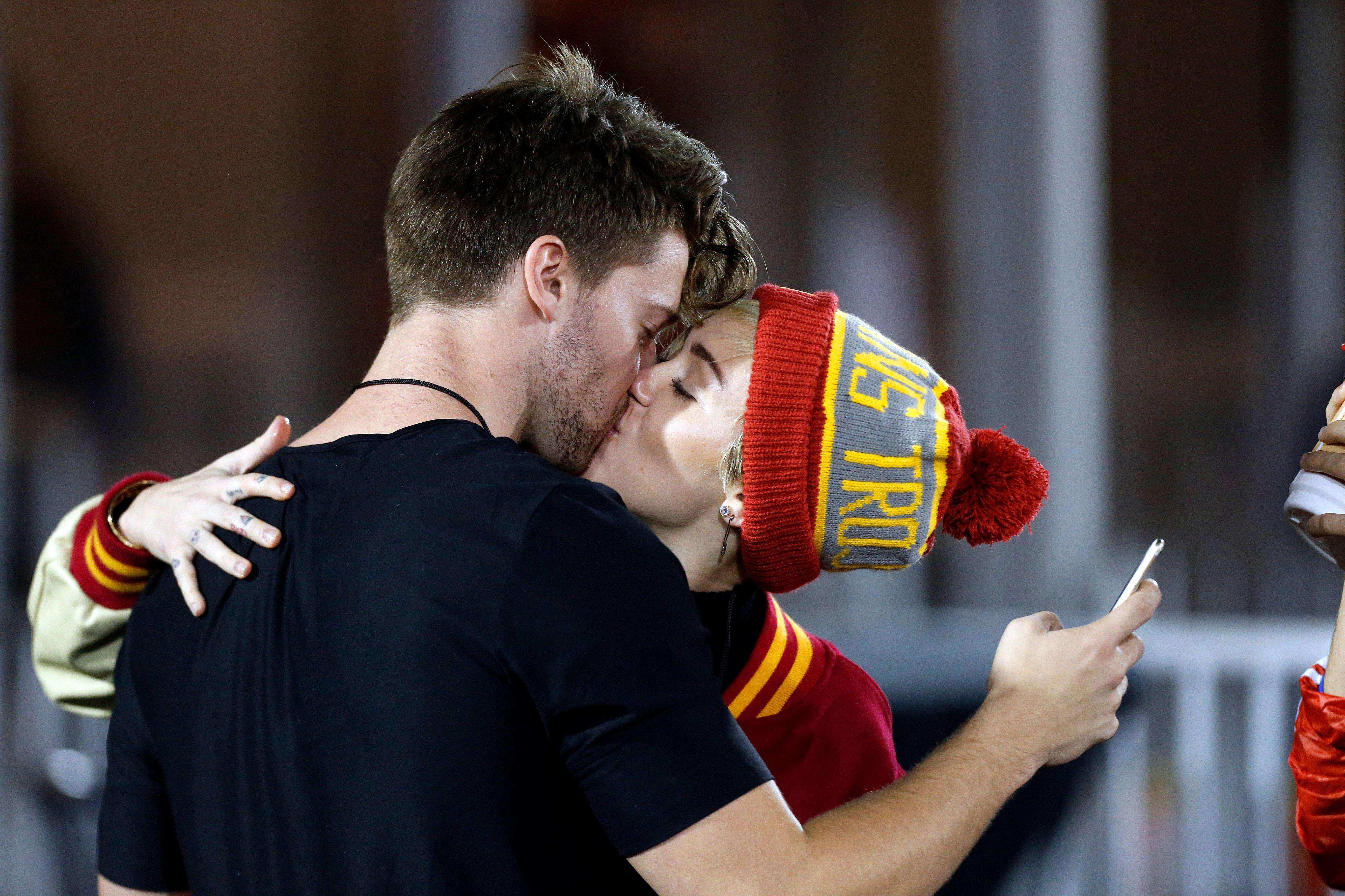 Patrick Schwarzenegger and Miley Cyrus sighting at USC football game