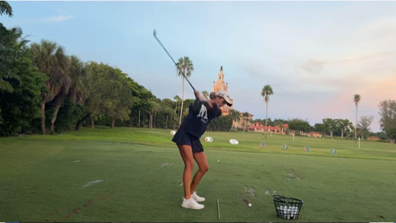 Image of Kai golfing.