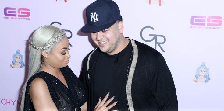 Blac Chyna and Rob Kardashian look happy as can be as they arrive on the purple carpet for her birthday party / Chymoji (emoji) release party at the Hard Rock Cafe in Hollywood, CA