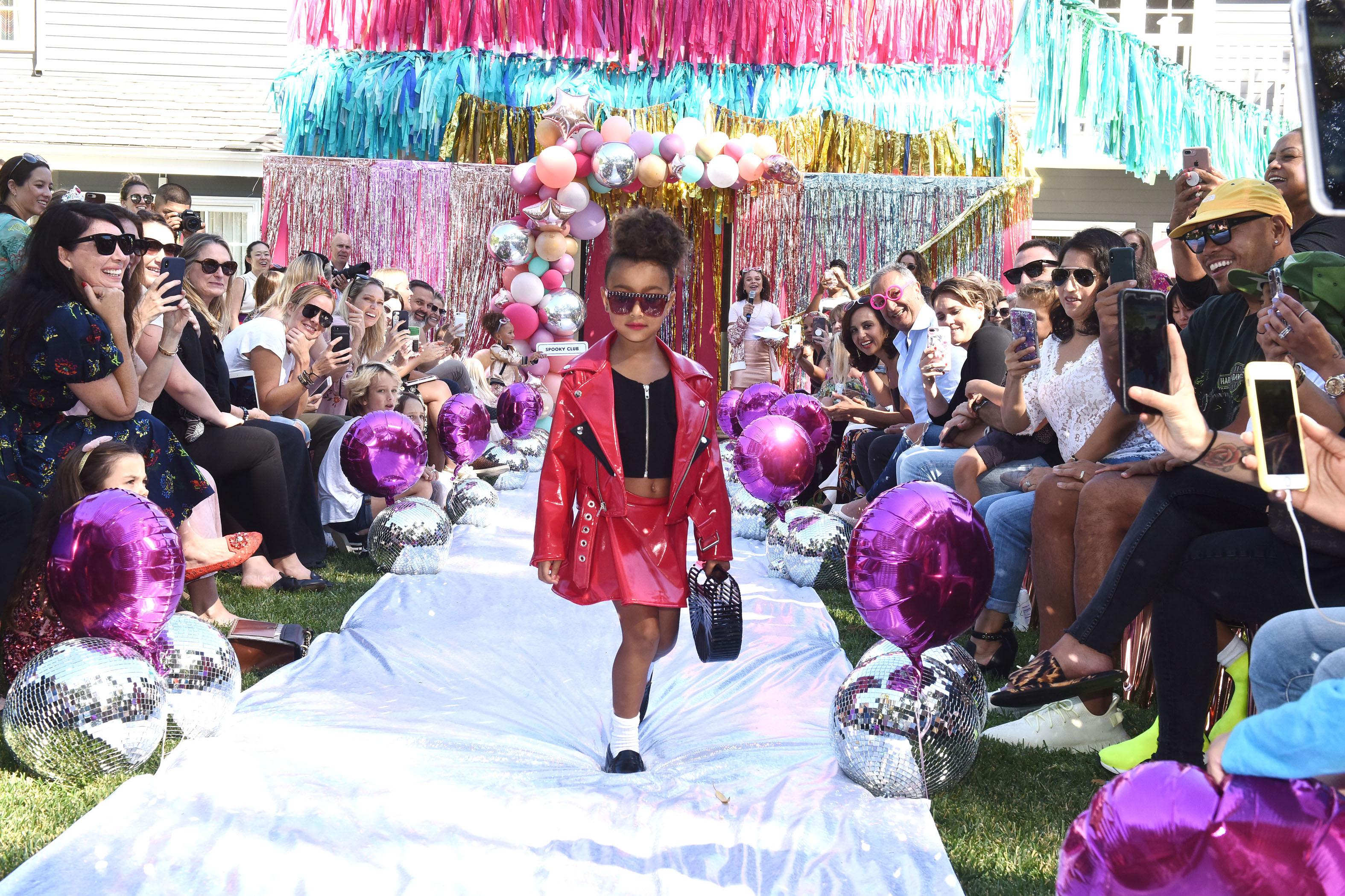 Kim Kardashian Attends North West`s Runway Debut at The L.O.L. Surprise! Fashion Show