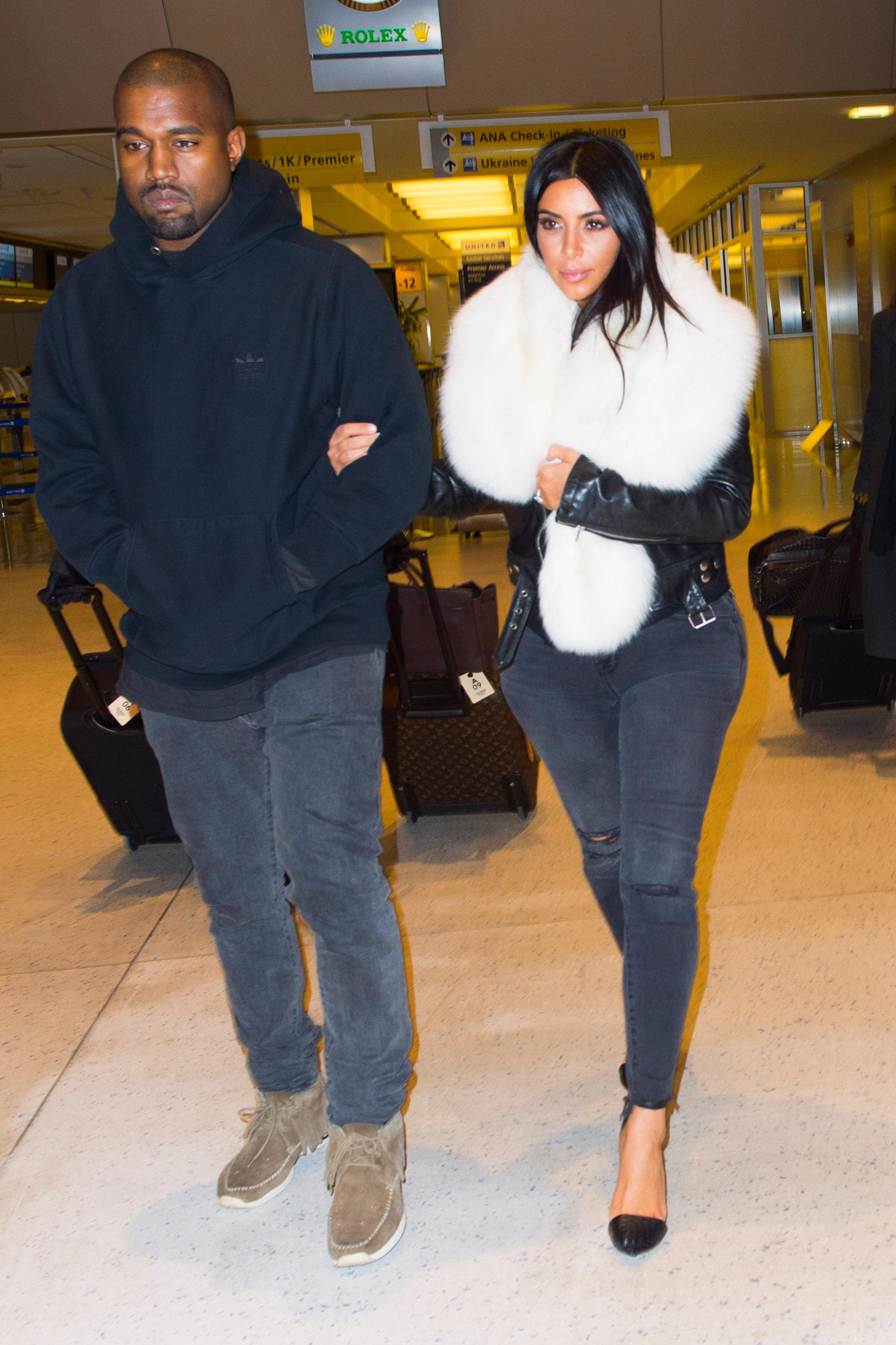 Kanye West and Kim Kardashian arrive at JFK Airport in NYC