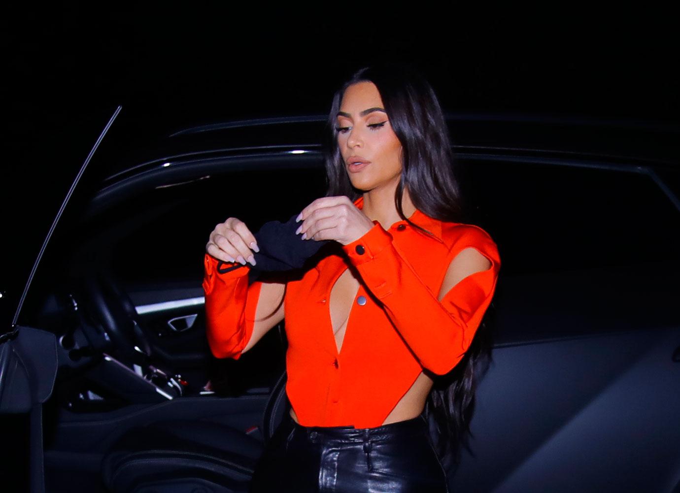 kim kardashian arriving lamborghini plunging neckline friends home dinner calabasas