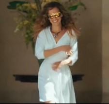 2009__12__carriebrad_satc2 225×214.jpg