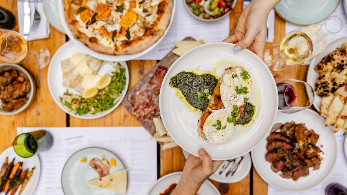 Image of Enjoy globally inspired wines on tap and seasonal small plates in a bright, lively Nashville spot with rooftop views of Broadway.